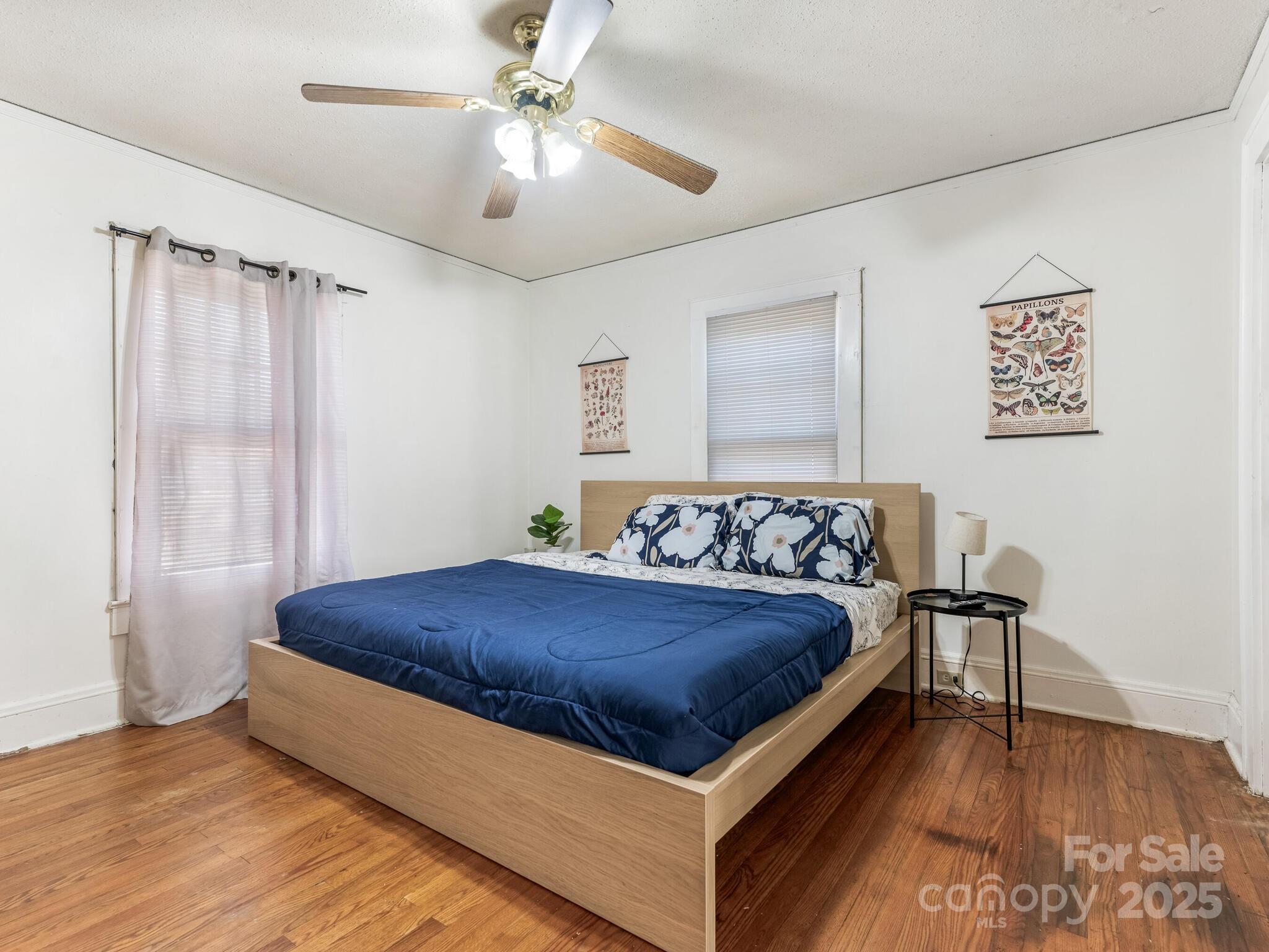 1008 Mable Avenue Kannapolis, NC 28083 - Photo 13 of 26 a spacious bedroom with a bed and a table