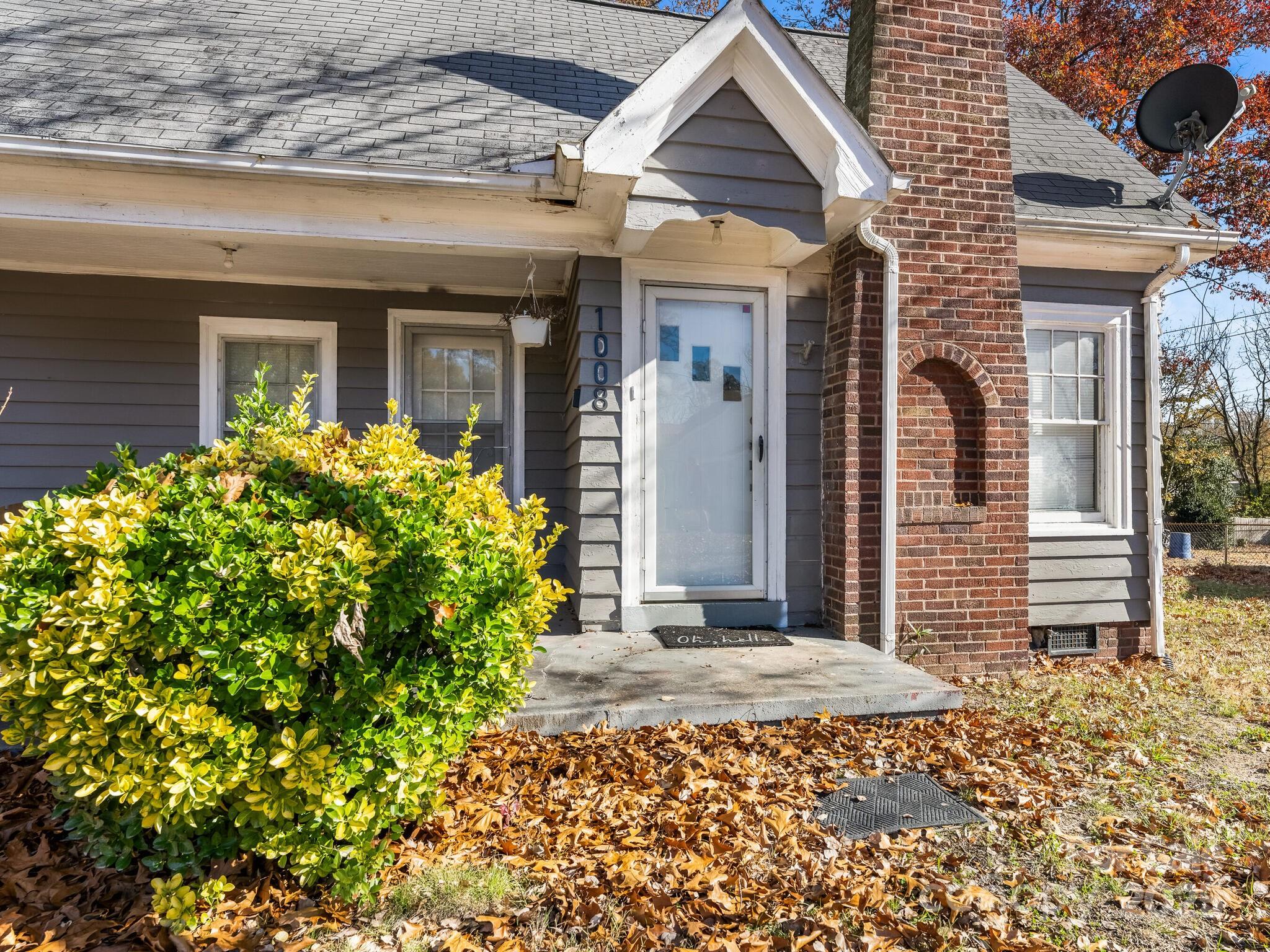 1008 Mable Avenue Kannapolis, NC 28083 - Photo 2 of 26 a front view of a house with garden