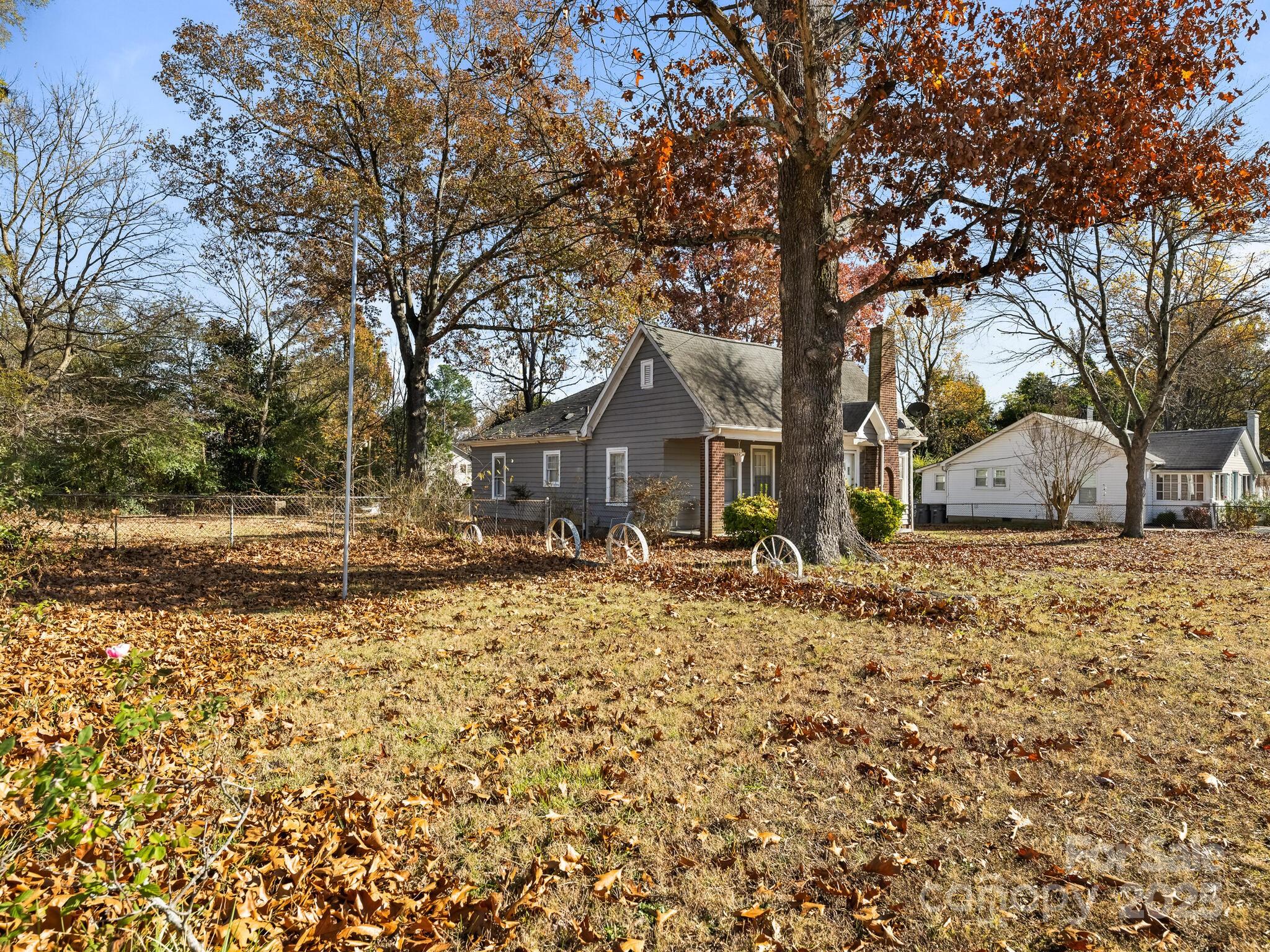 1008 Mable Avenue Kannapolis, NC 28083 - Photo 25 of 26 a house with trees in front of it