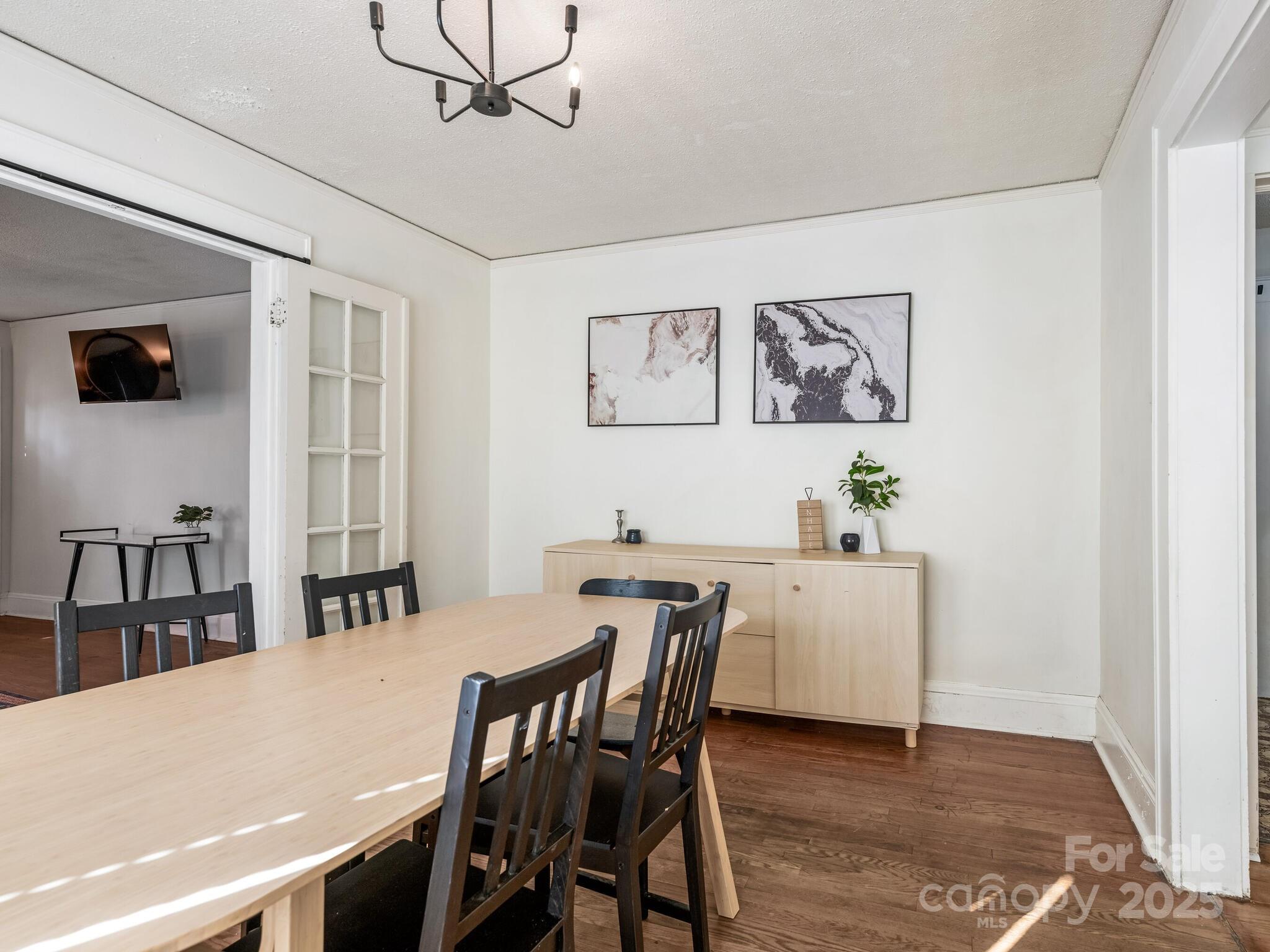 1008 Mable Avenue Kannapolis, NC 28083 - Photo 6 of 26 a view of a dining room with furniture and wooden floor