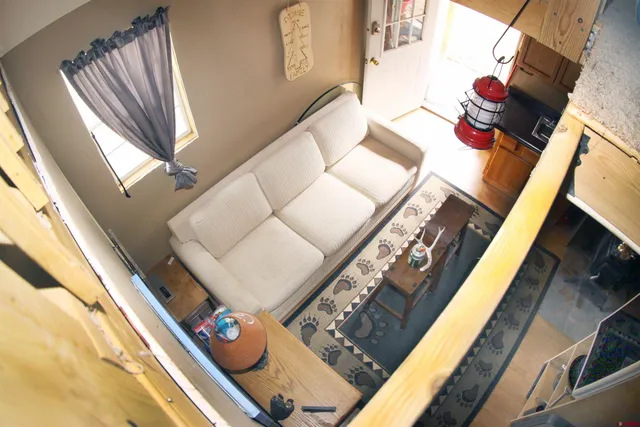 a view of a kitchen with car parked