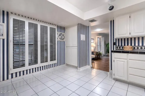 a view of a livingroom with a kitchen
