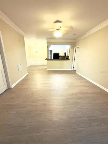 a view of a bathroom with a sink and a mirror
