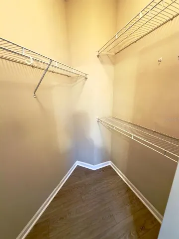 a view of a room with racks on the wall