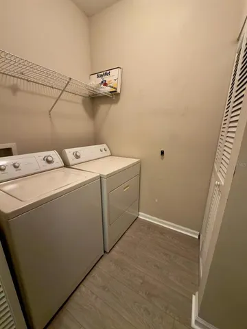 a utility room with dryer and washer