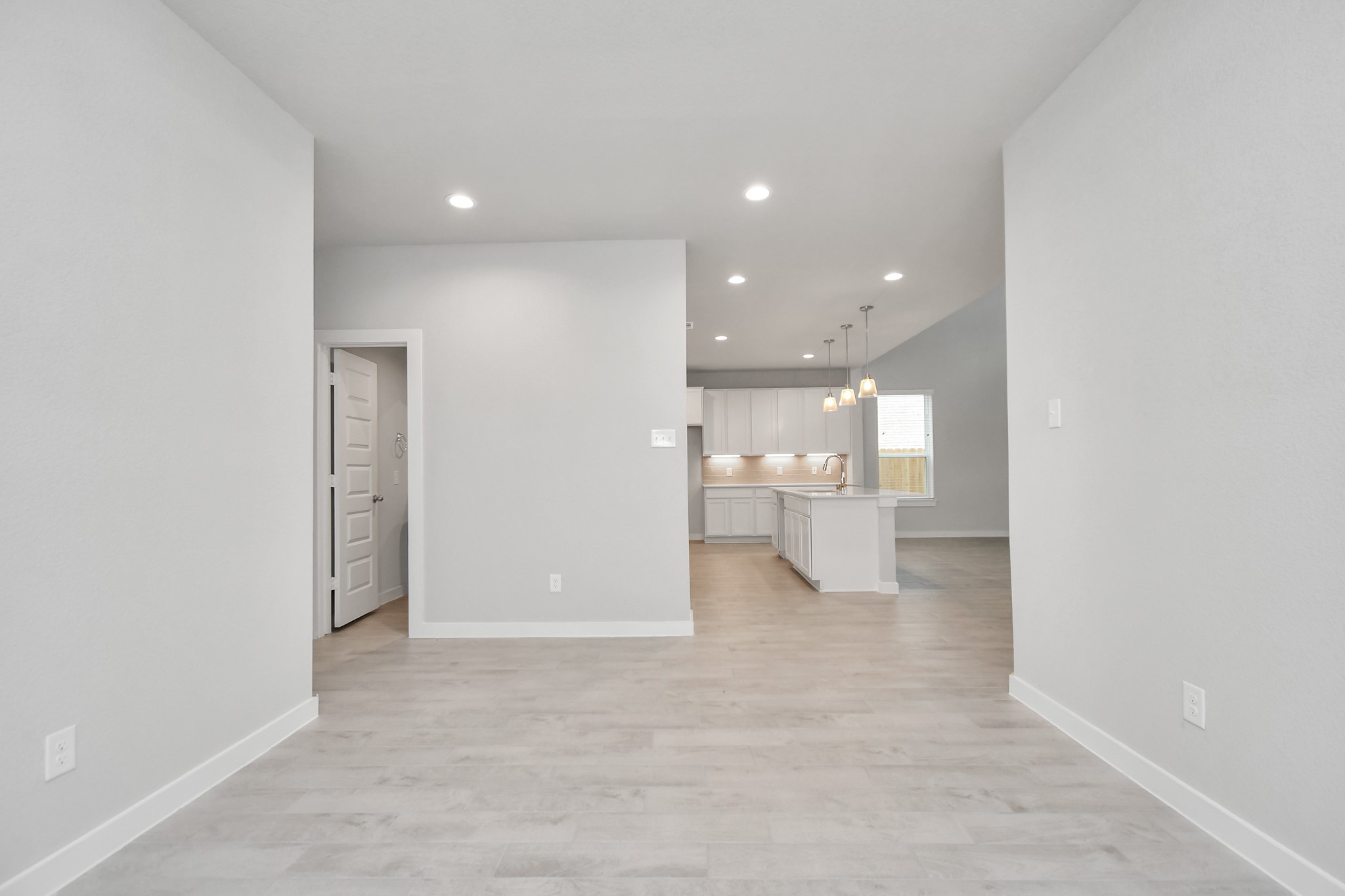 15111 Statice Trail Houston, TX 77044 - Photo 12 of 35 View from the dining space. Sample photo of completed home with similar floor plan. Actual colors and selections may vary.