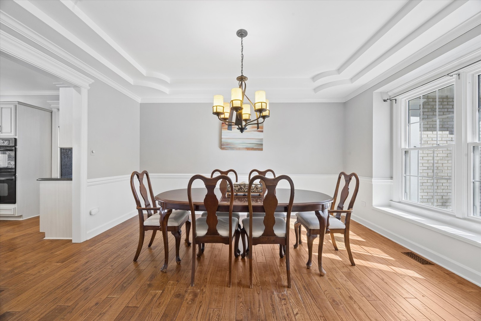 2711 Wendy Road Naperville, IL 60565 - Photo 14 of 49 a dining room with furniture window wooden floor