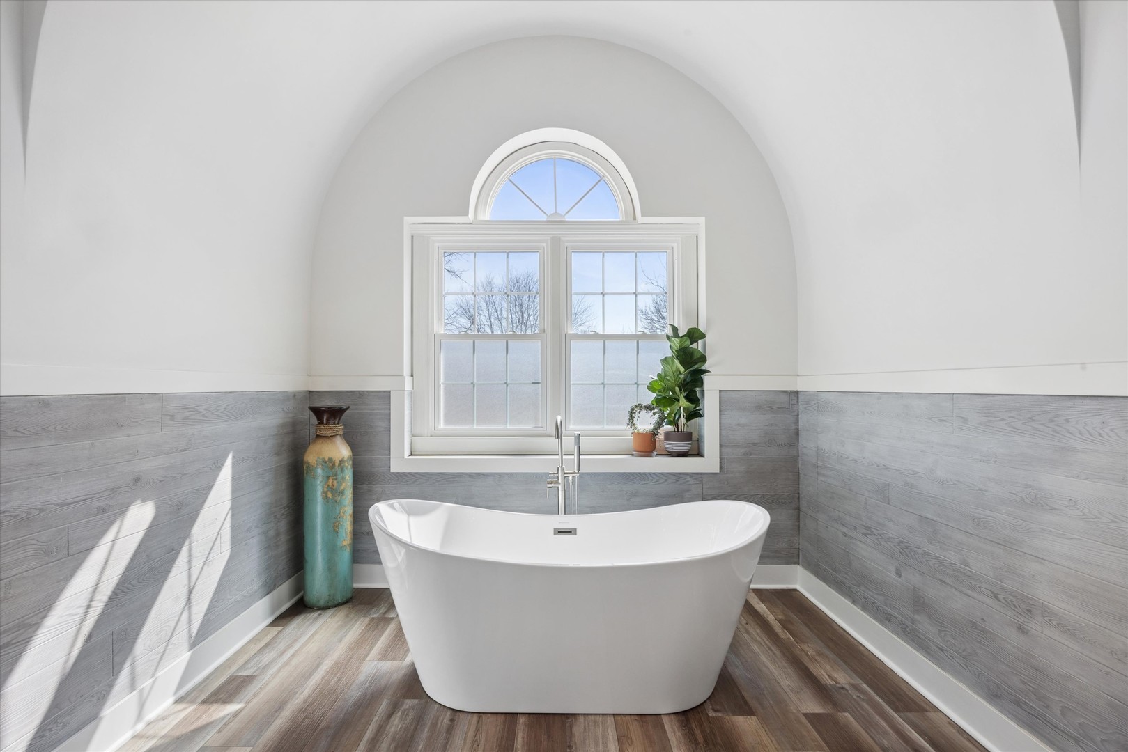 2711 Wendy Road Naperville, IL 60565 - Photo 23 of 49 a white bath tub sitting in a bathroom next to a window