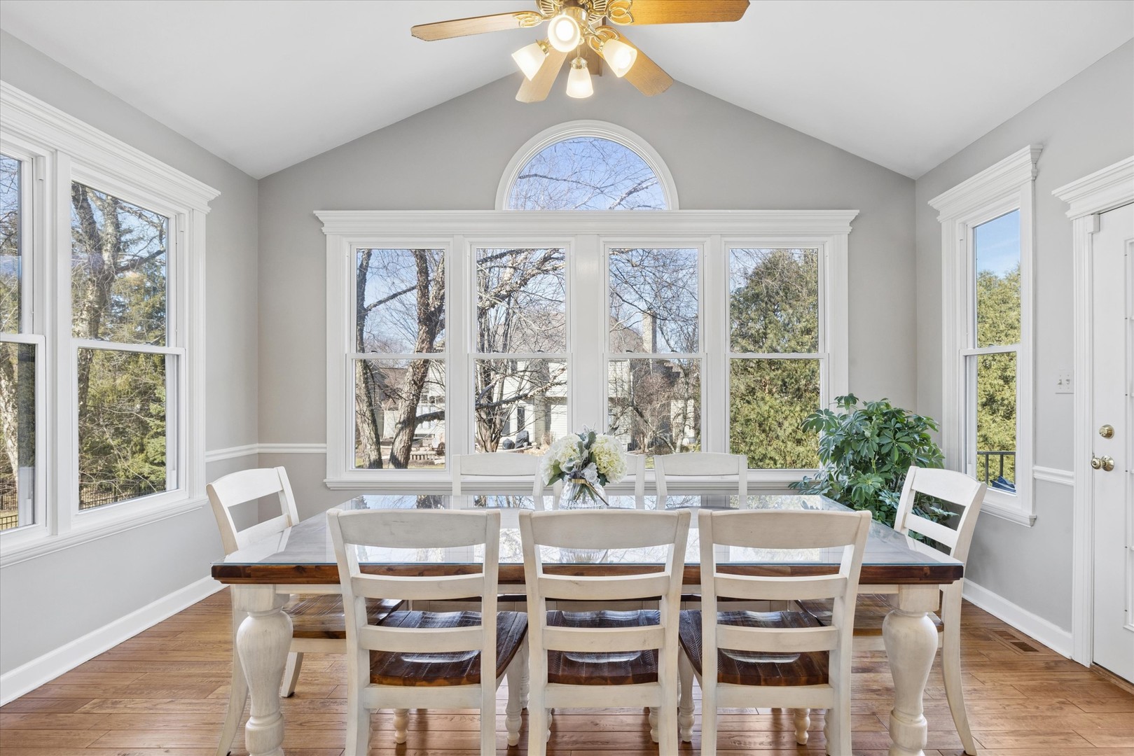 2711 Wendy Road Naperville, IL 60565 - Photo 9 of 49 a view of a dining room with furniture wooden floor and chandelier