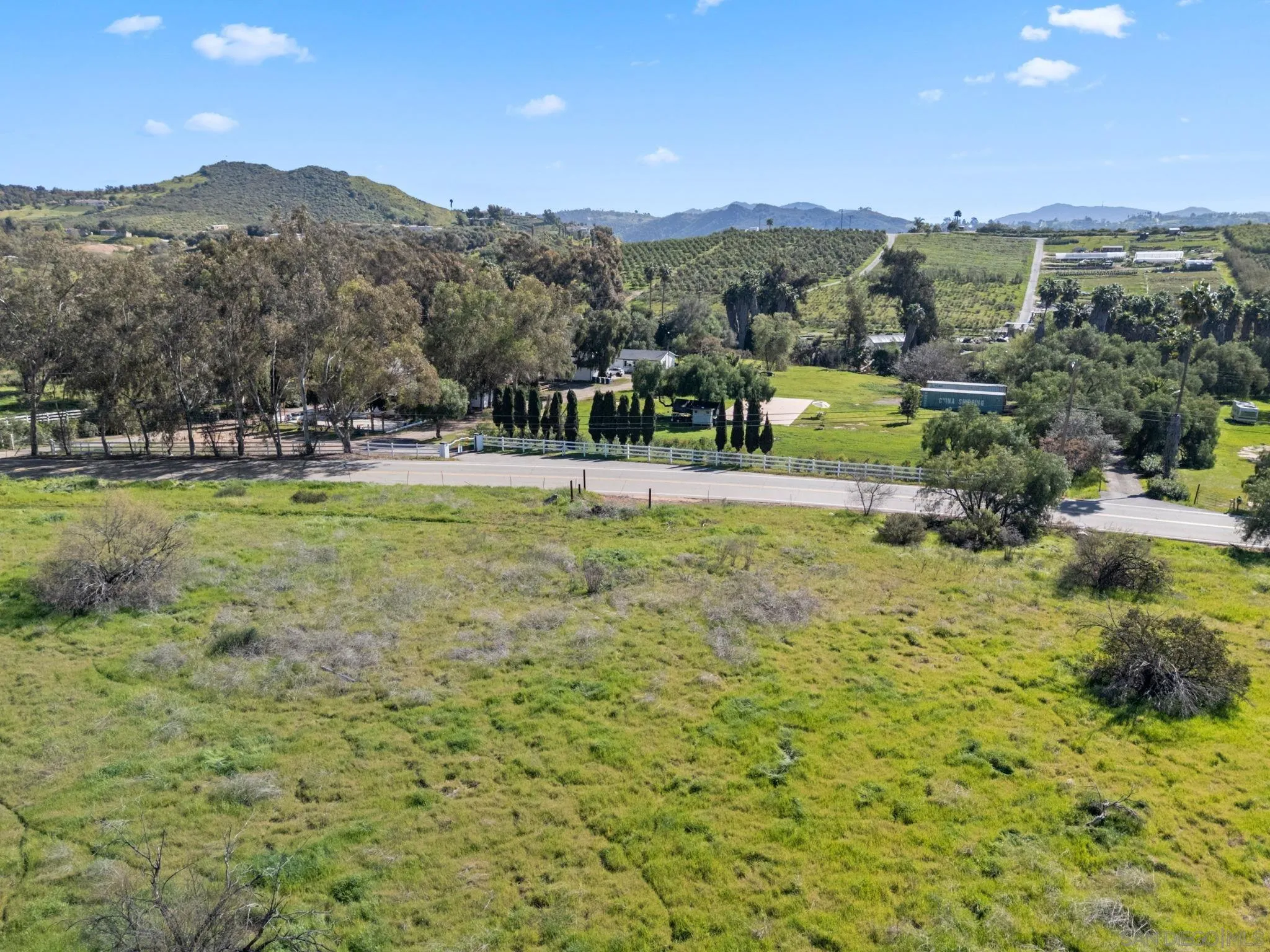 0 West Lilac Road, Unit 20 Bonsall, CA 92003 - Photo 13 of 18 a view of a town with mountains in the background