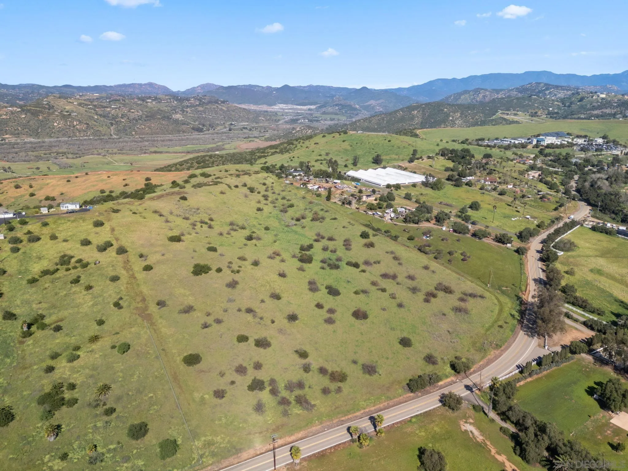0 West Lilac Road, Unit 20 Bonsall, CA 92003 - Photo 7 of 18 a view of a city and mountains in the background