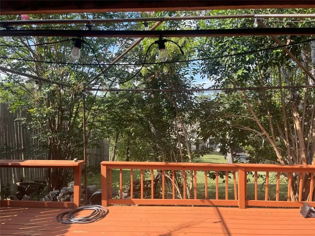 a view of swimming pool with seating area