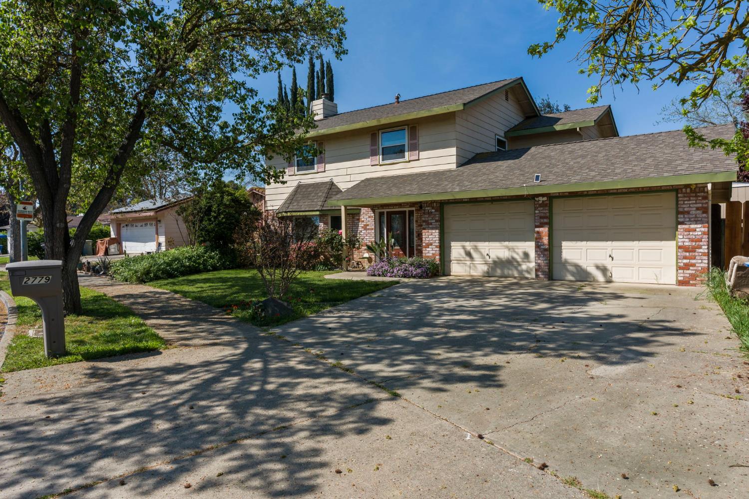 2779 Story Avenue Merced, CA 95340 - Photo 2 of 27 a front view of a house with garden