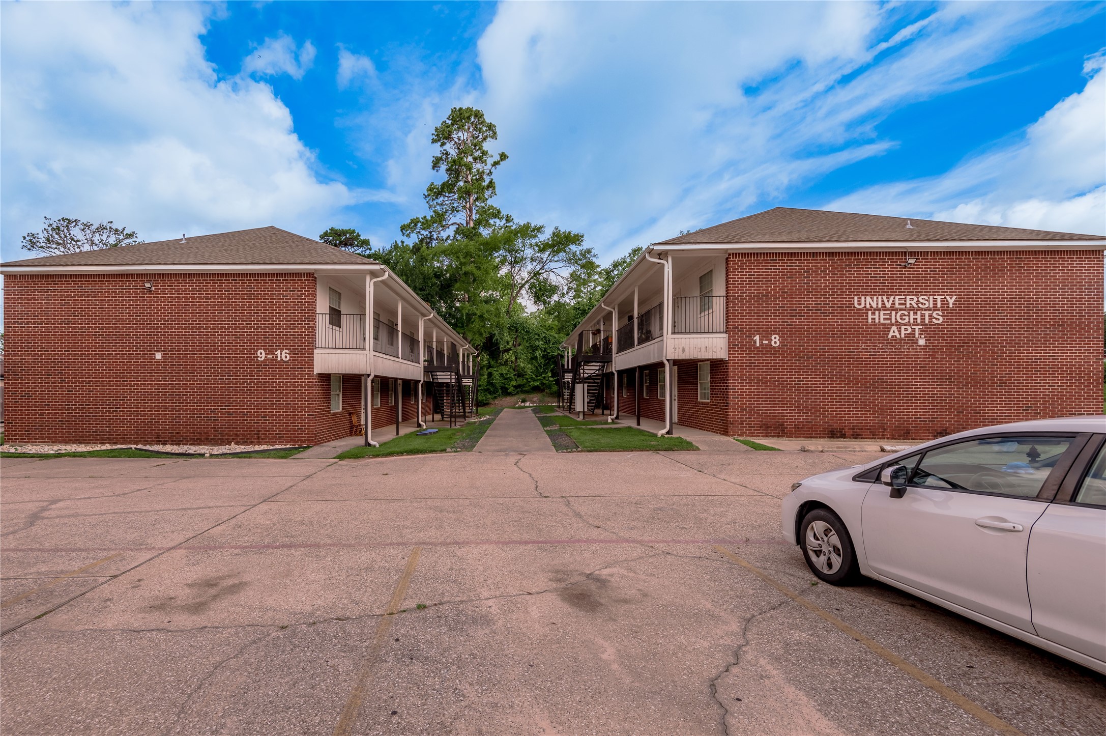 600 Palm Street, Unit 12 Huntsville, TX 77340 - Photo 20 of 23 a view of a car in front of a house