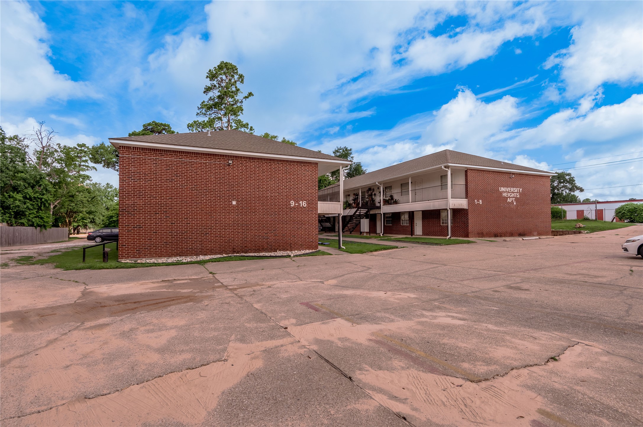 600 Palm Street, Unit 12 Huntsville, TX 77340 - Photo 21 of 23 a front view of a house with a garden