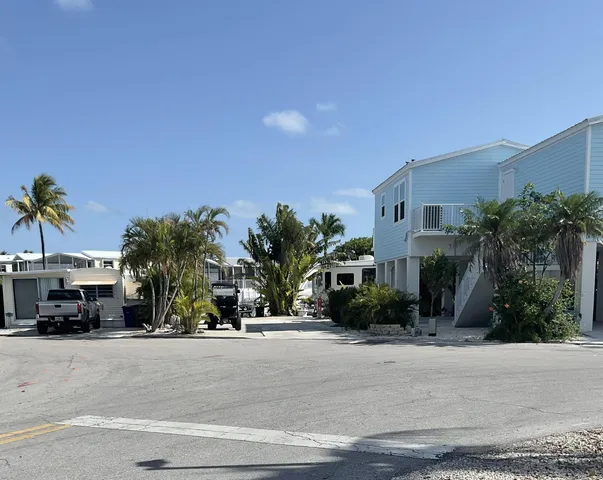 a view of road and car parked
