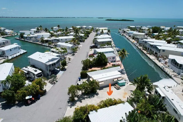 an aerial view of a house with outdoor space