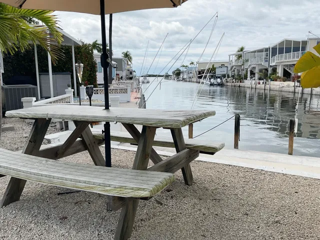 a view of swimming pool with outdoor seating