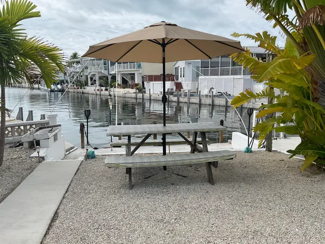 a view of a terrace with sitting area