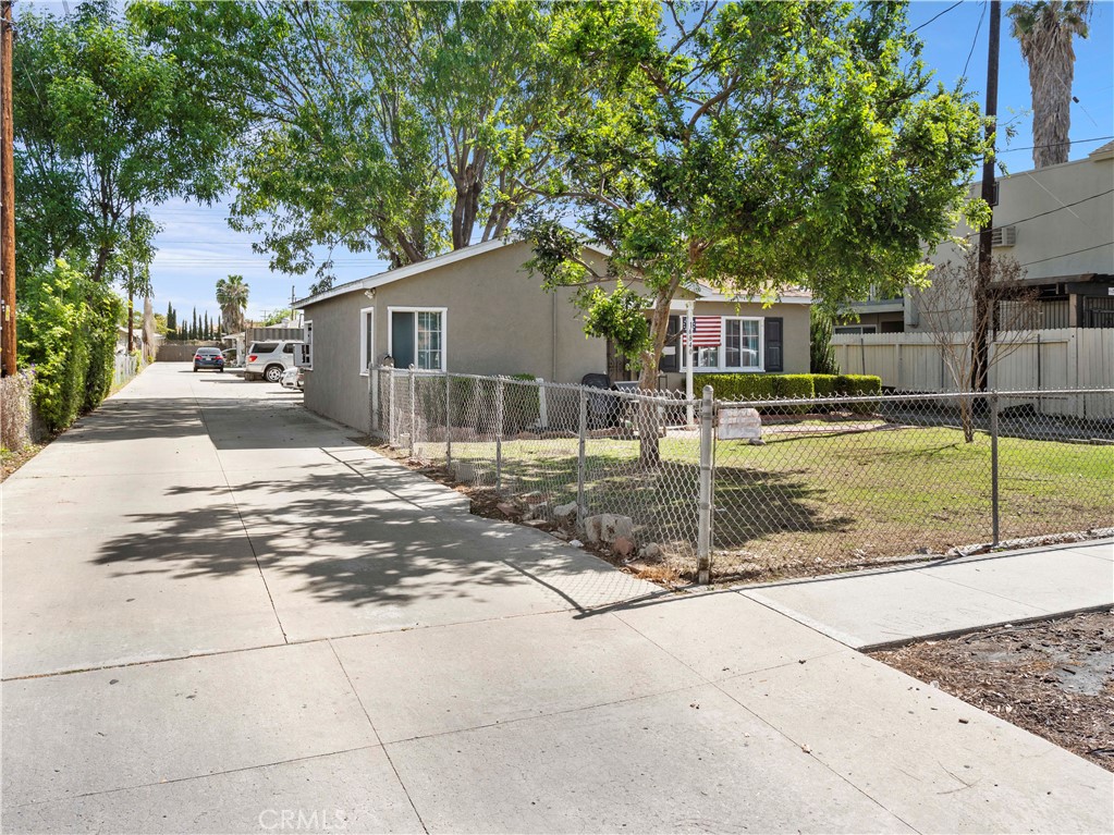 16840 Passage Paramount Ca Paramount, CA 90723 - Photo 2 of 16 a view of a house with backyard and a tree