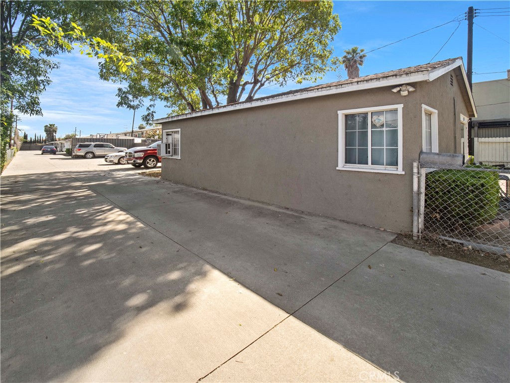 16840 Passage Paramount Ca Paramount, CA 90723 - Photo 4 of 16 a view of a street with a house