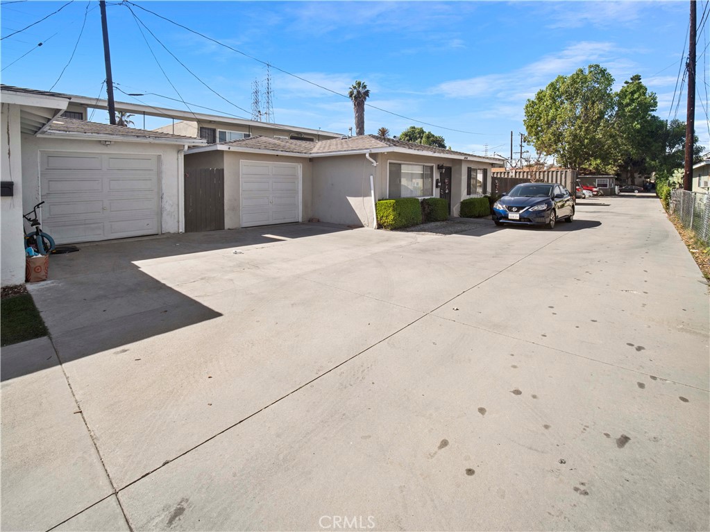 16840 Passage Paramount Ca Paramount, CA 90723 - Photo 10 of 16 a view of a yard with cars