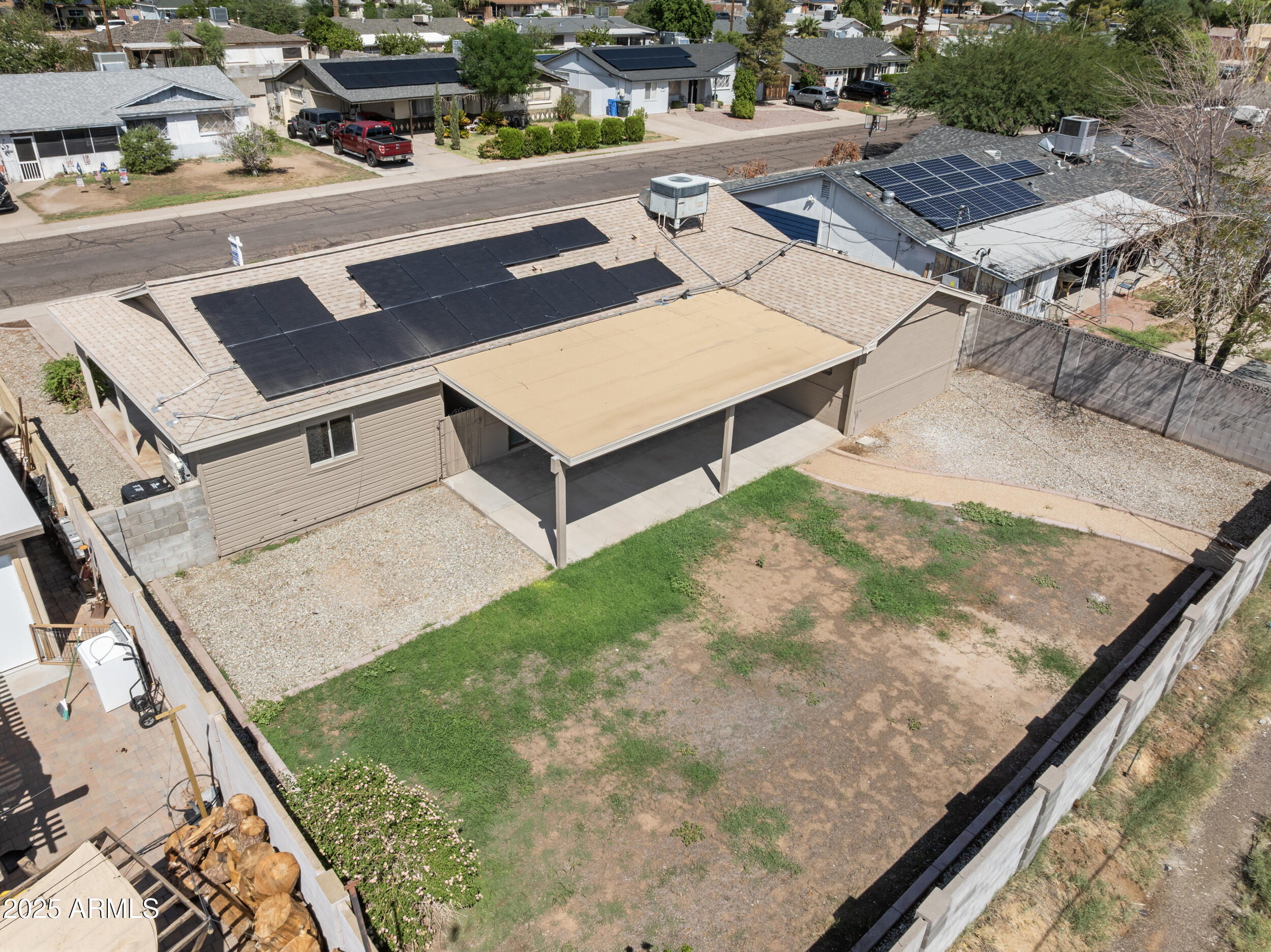 3339 West Shaw Butte Drive Phoenix, AZ 85029 - Photo 16 of 16 an aerial view of a house with a garden and mountain view