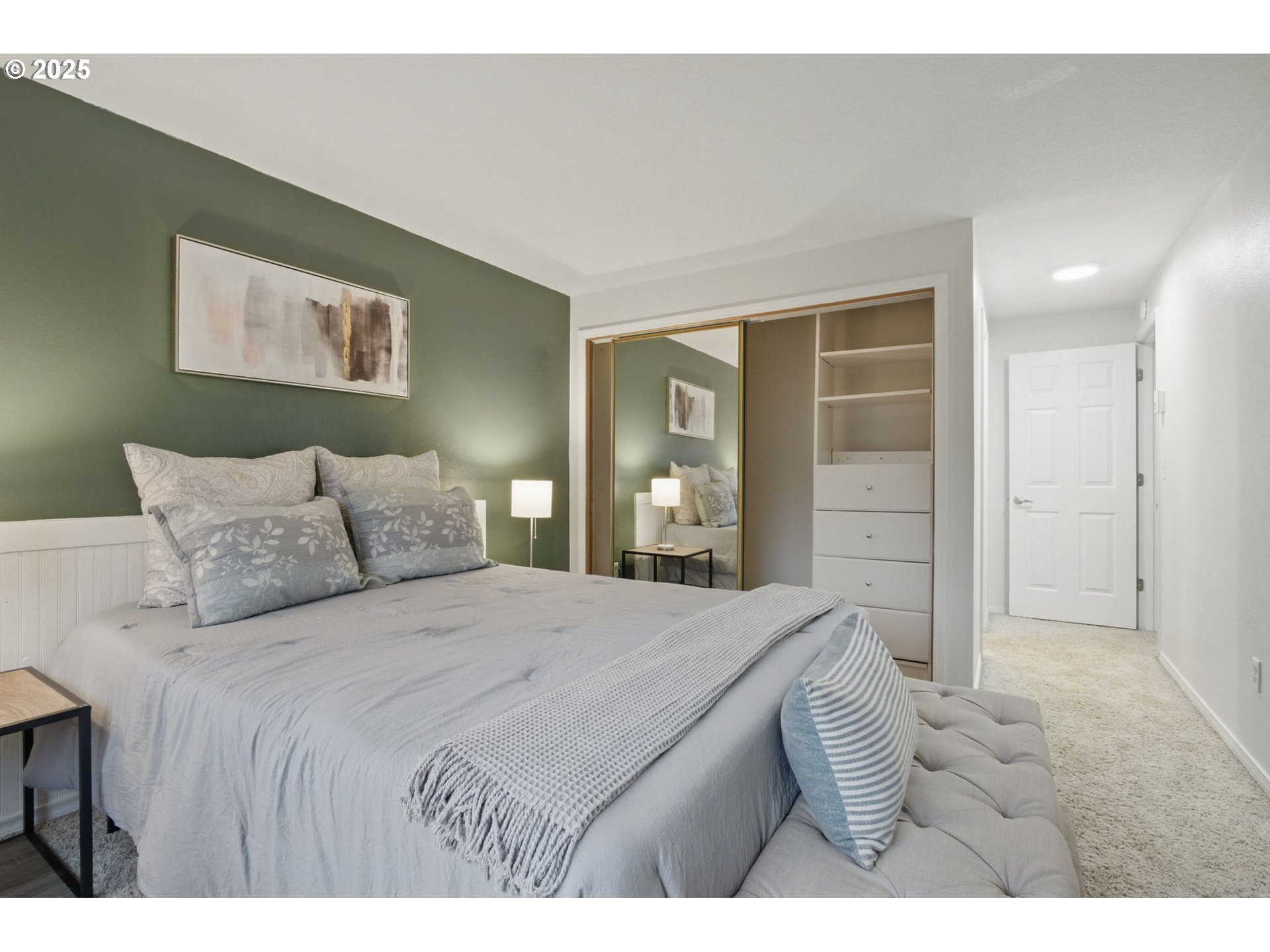 29460 Southwest Volley Street, Unit 67 Wilsonville, OR 97070 - Photo 11 of 24 a bedroom with a bed and a lamp