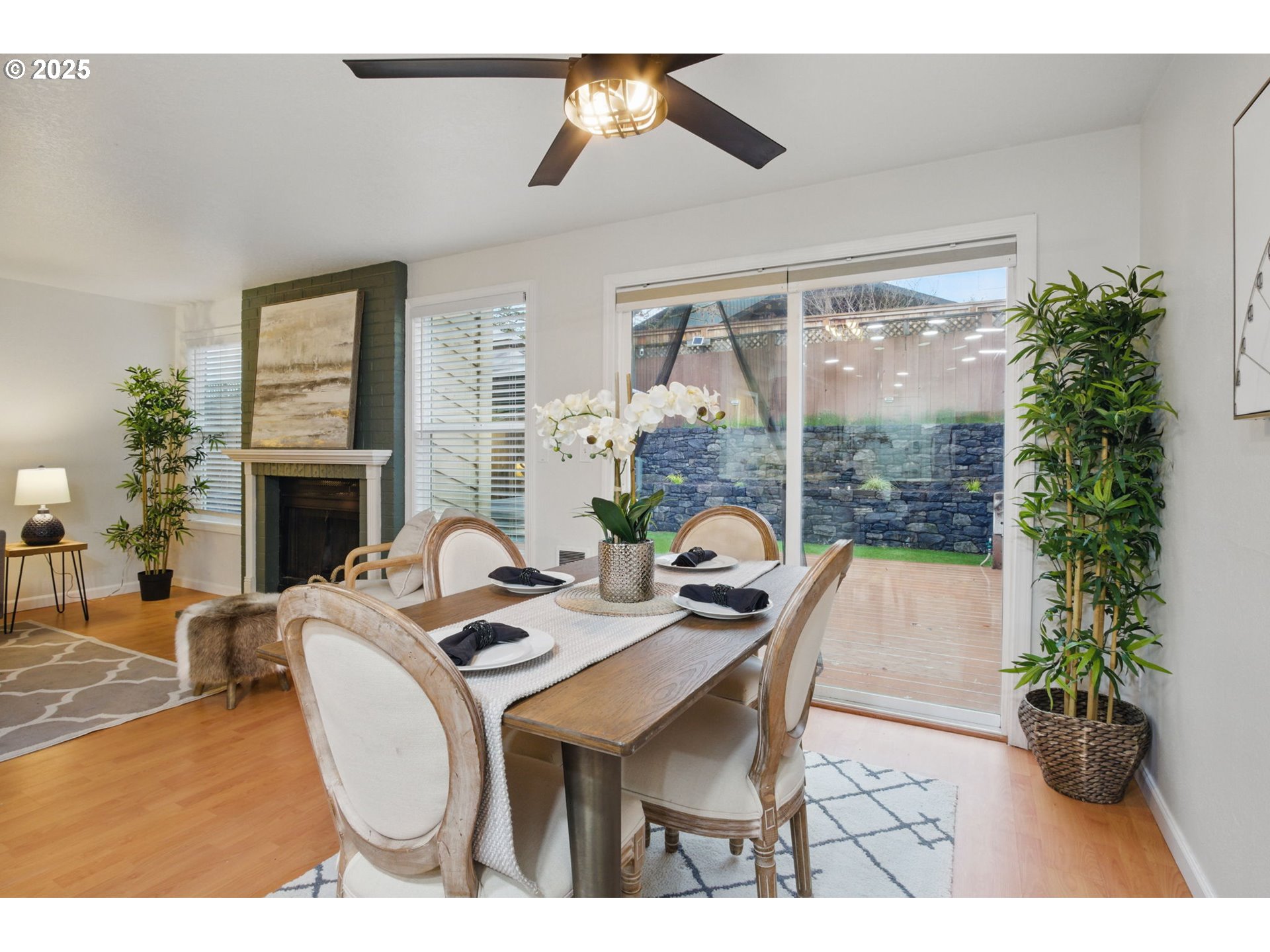 29460 Southwest Volley Street, Unit 67 Wilsonville, OR 97070 - Photo 4 of 24 a dining room with furniture window and wooden floor