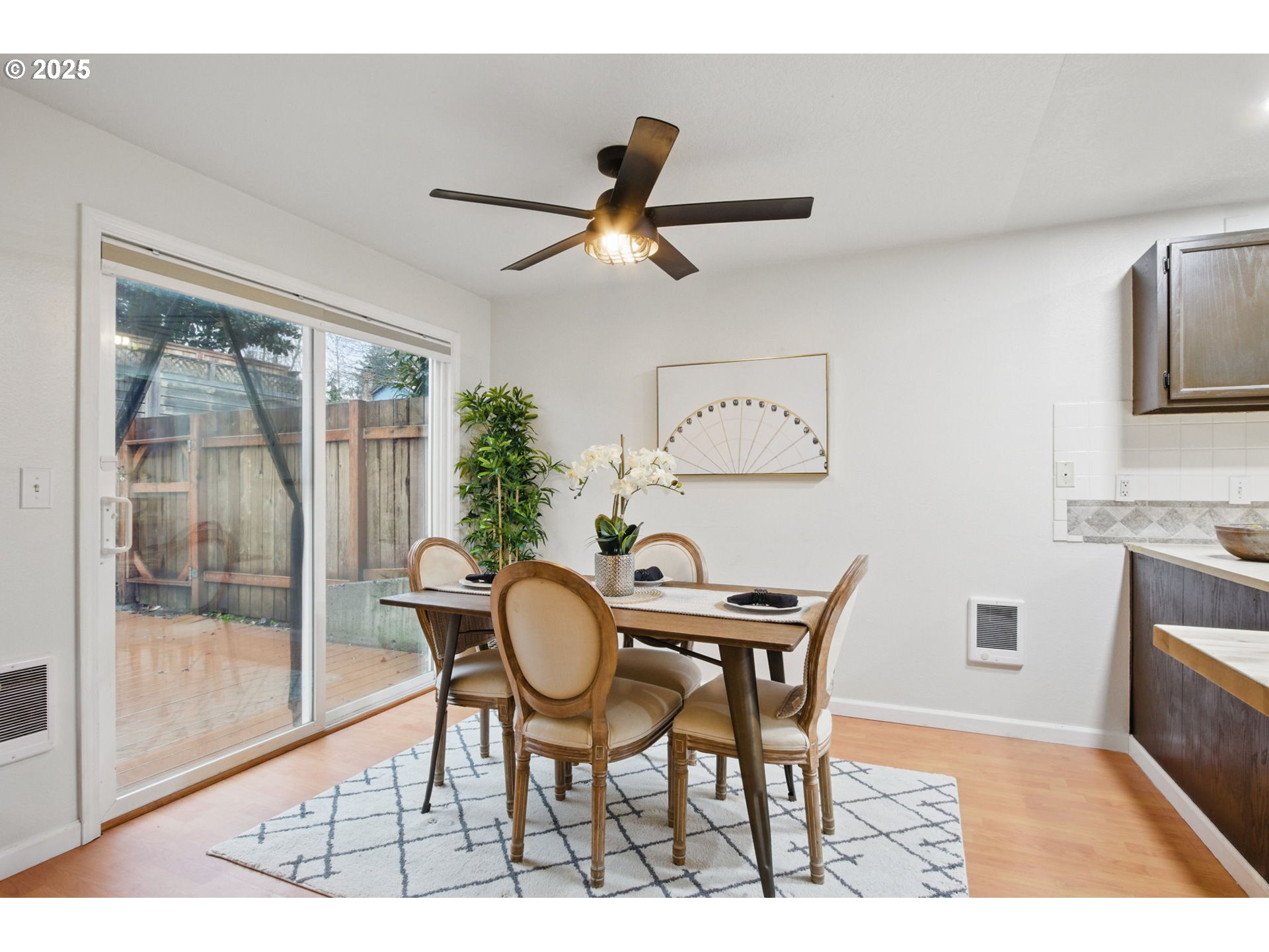 29460 Southwest Volley Street, Unit 67 Wilsonville, OR 97070 - Photo 5 of 24 a view of kitchen and dining area with furniture