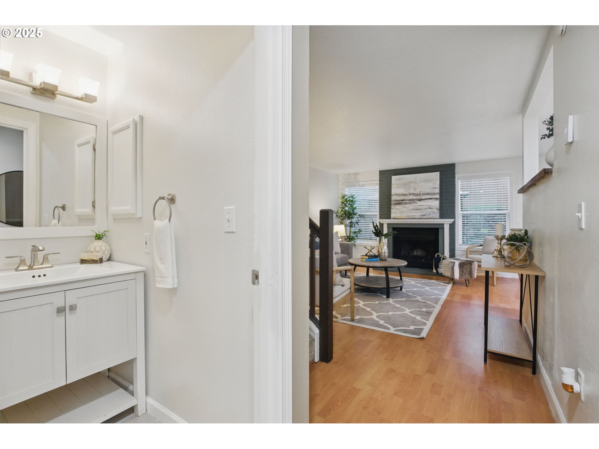 29460 Southwest Volley Street, Unit 67 Wilsonville, OR 97070 - Photo 9 of 24 a living room with furniture a fireplace and a flat screen tv