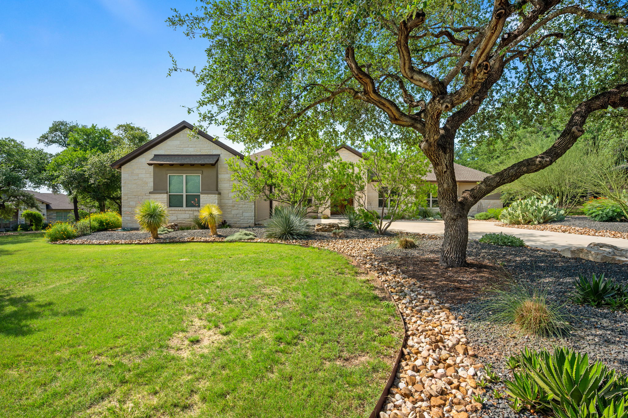 212 Marbella Way Georgetown, TX 78633 - Photo 38 of 40 a front view of a house with garden