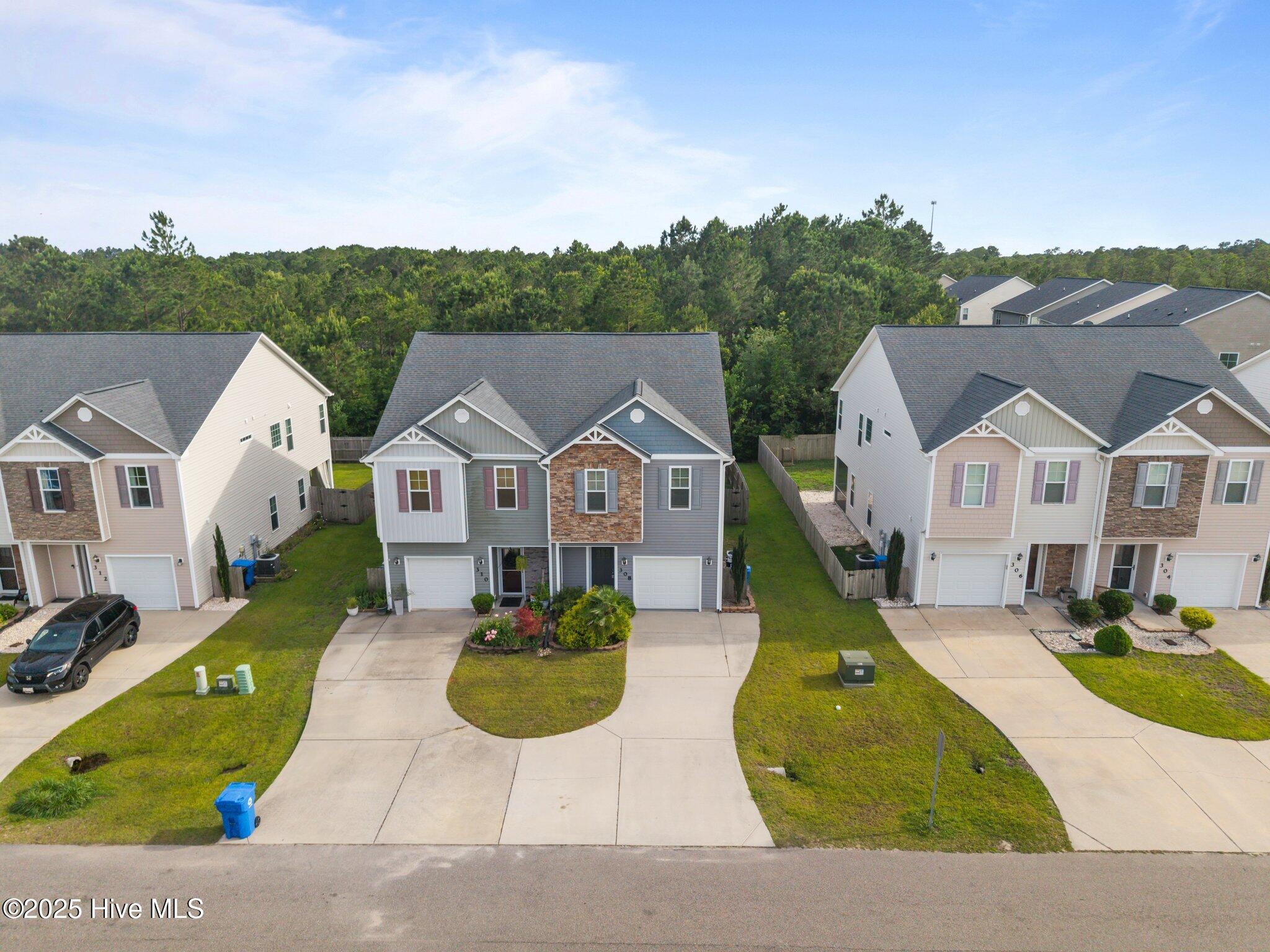 308 Frisco Way Holly Ridge, NC 28445 - Photo 2 of 53 1-web-or-mls-DJI_20250612173634_0554_D