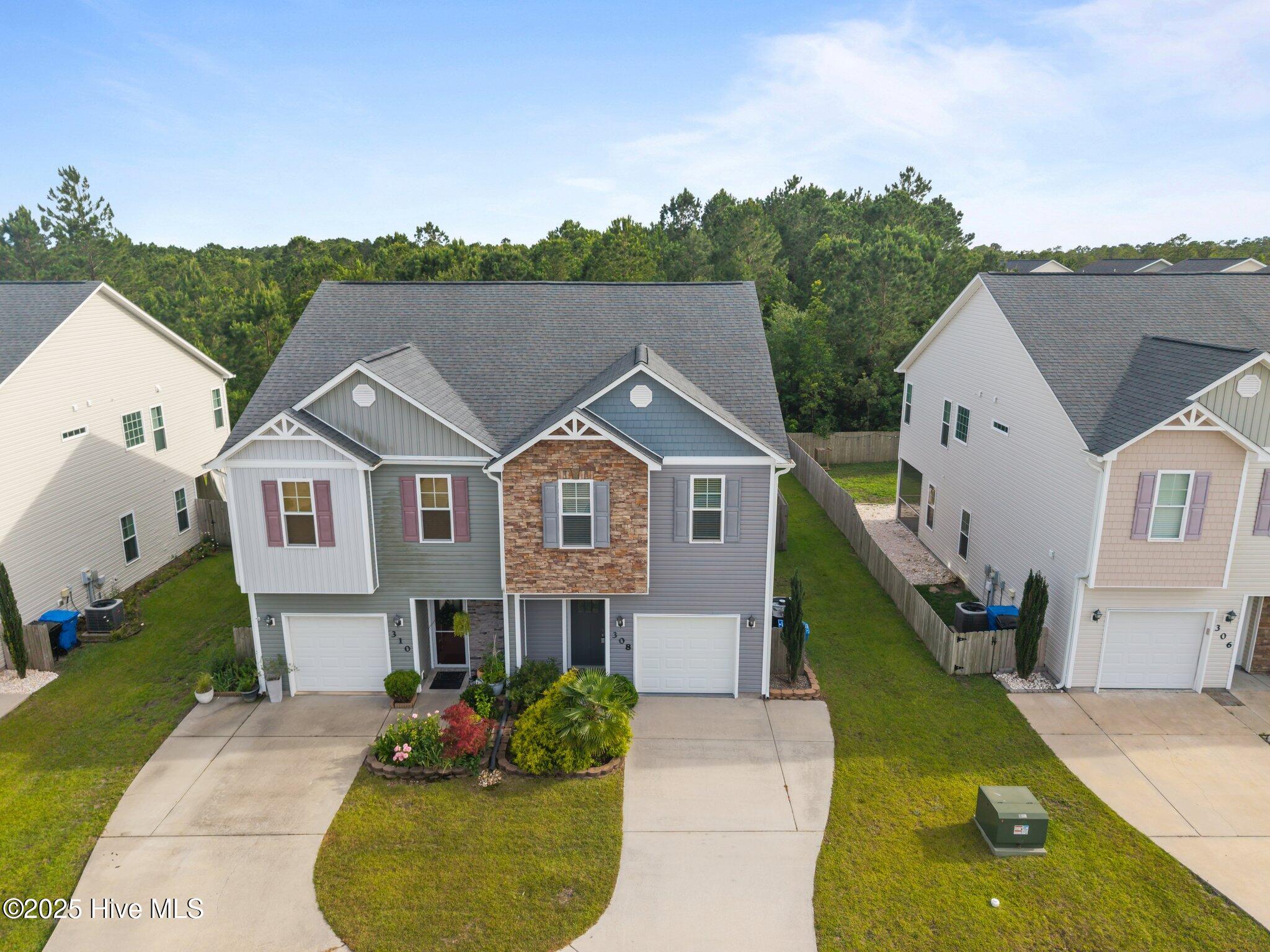 308 Frisco Way Holly Ridge, NC 28445 - Photo 3 of 53 3-web-or-mls-DJI_20250612173627_0553_D