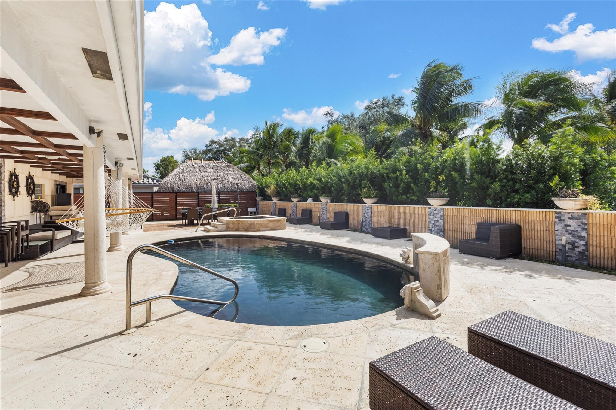 5223 Deerhurst Crescent Circle Boca Raton, FL 33486 - Photo 46 of 51 a view of swimming pool with seating space