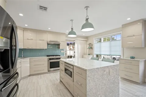 $899,999 | 939 Manor Lane, Bay Shore, NY 11706