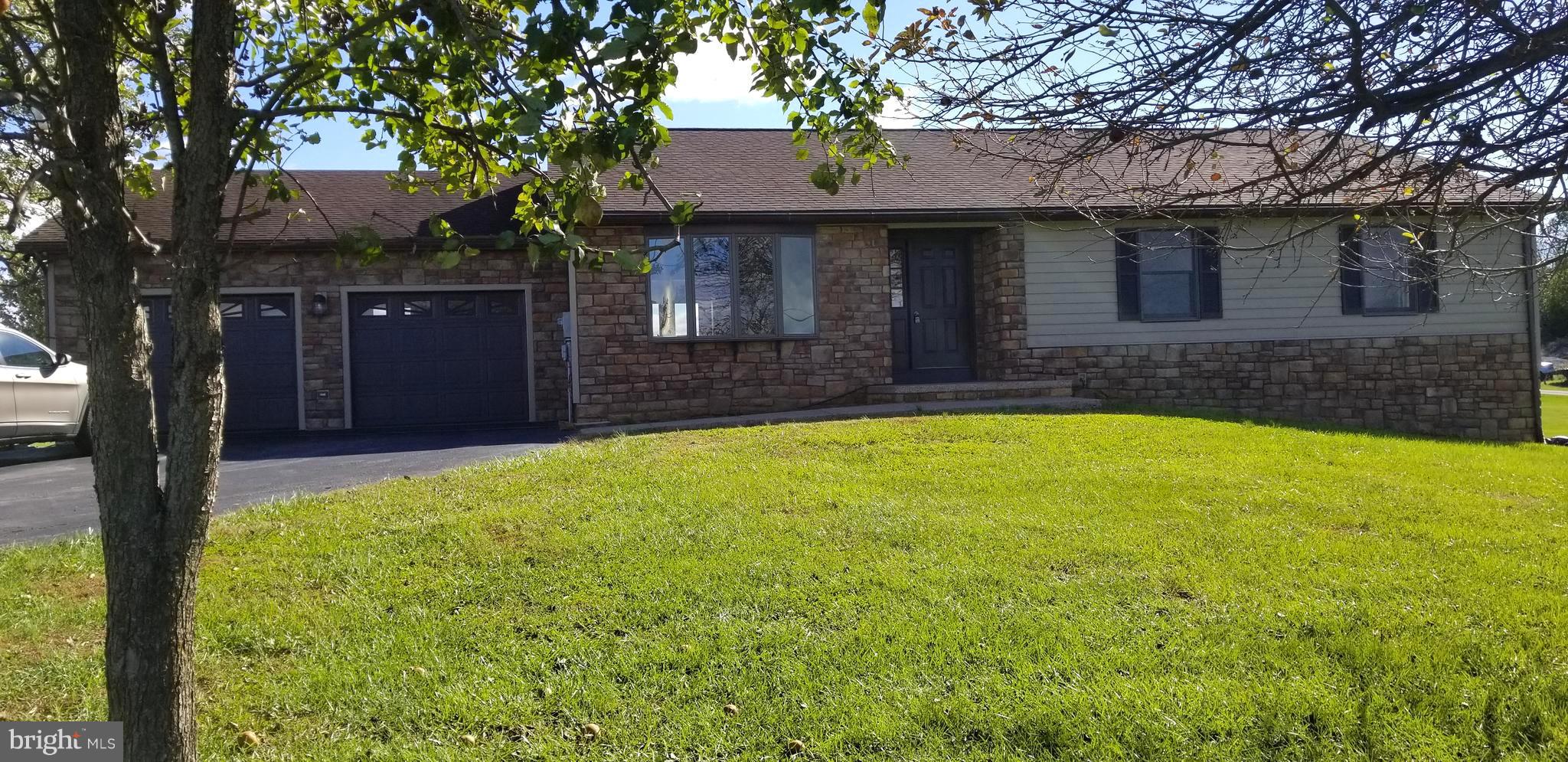 15515 Broadfording Road Clear Spring, MD 21722 - Photo 1 of 19 a front view of house with yard and trees