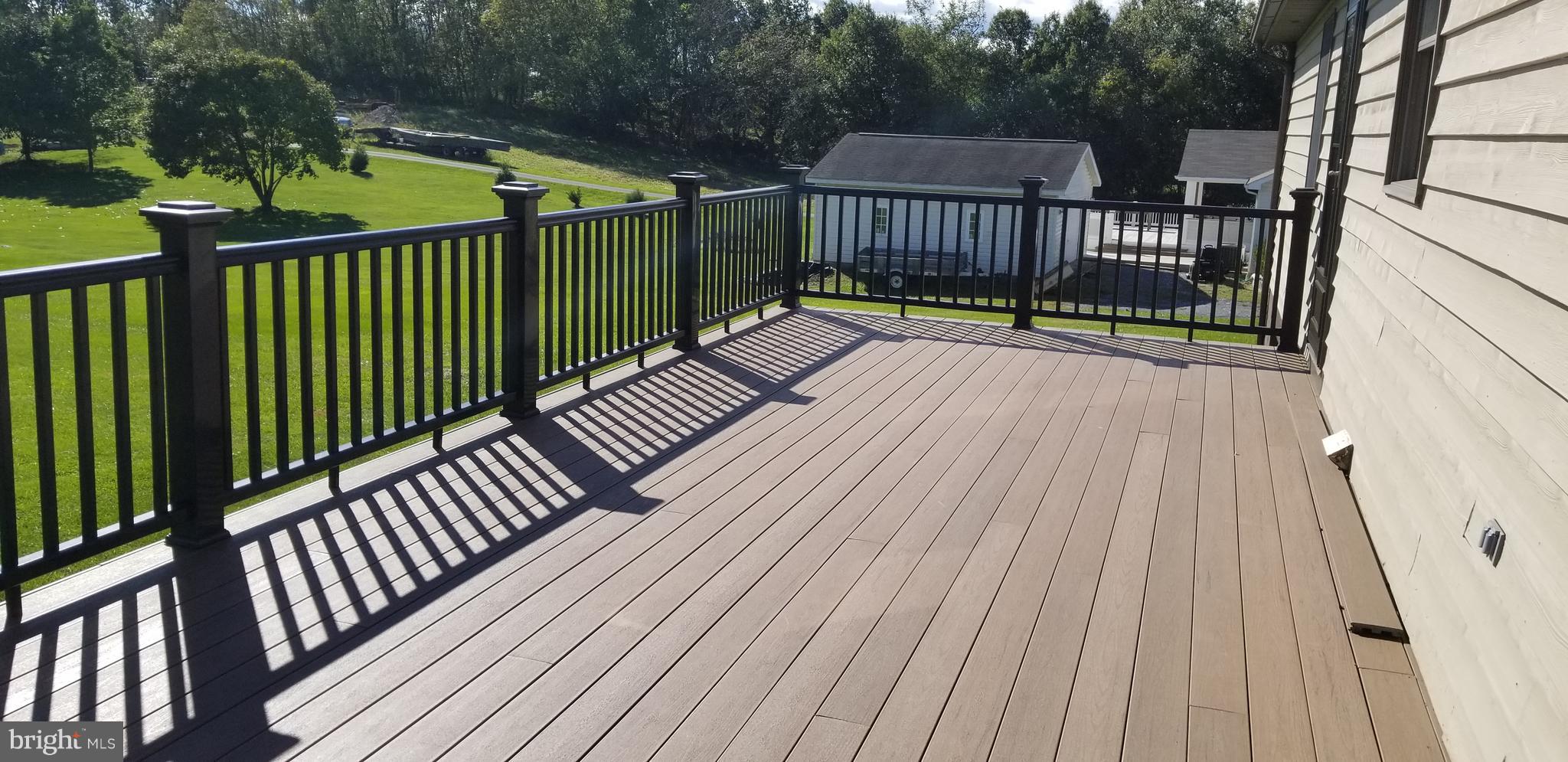 15515 Broadfording Road Clear Spring, MD 21722 - Photo 11 of 19 a view of a wooden deck