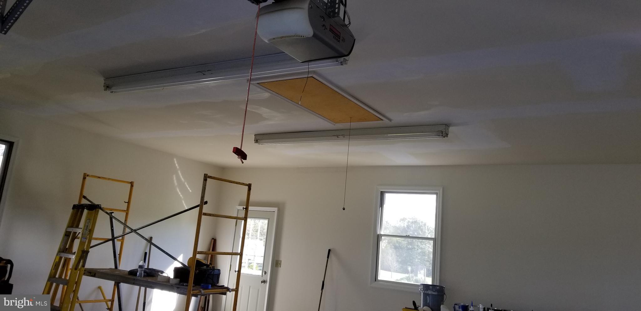 15515 Broadfording Road Clear Spring, MD 21722 - Photo 14 of 19 a ceiling fan sitting on top of a room