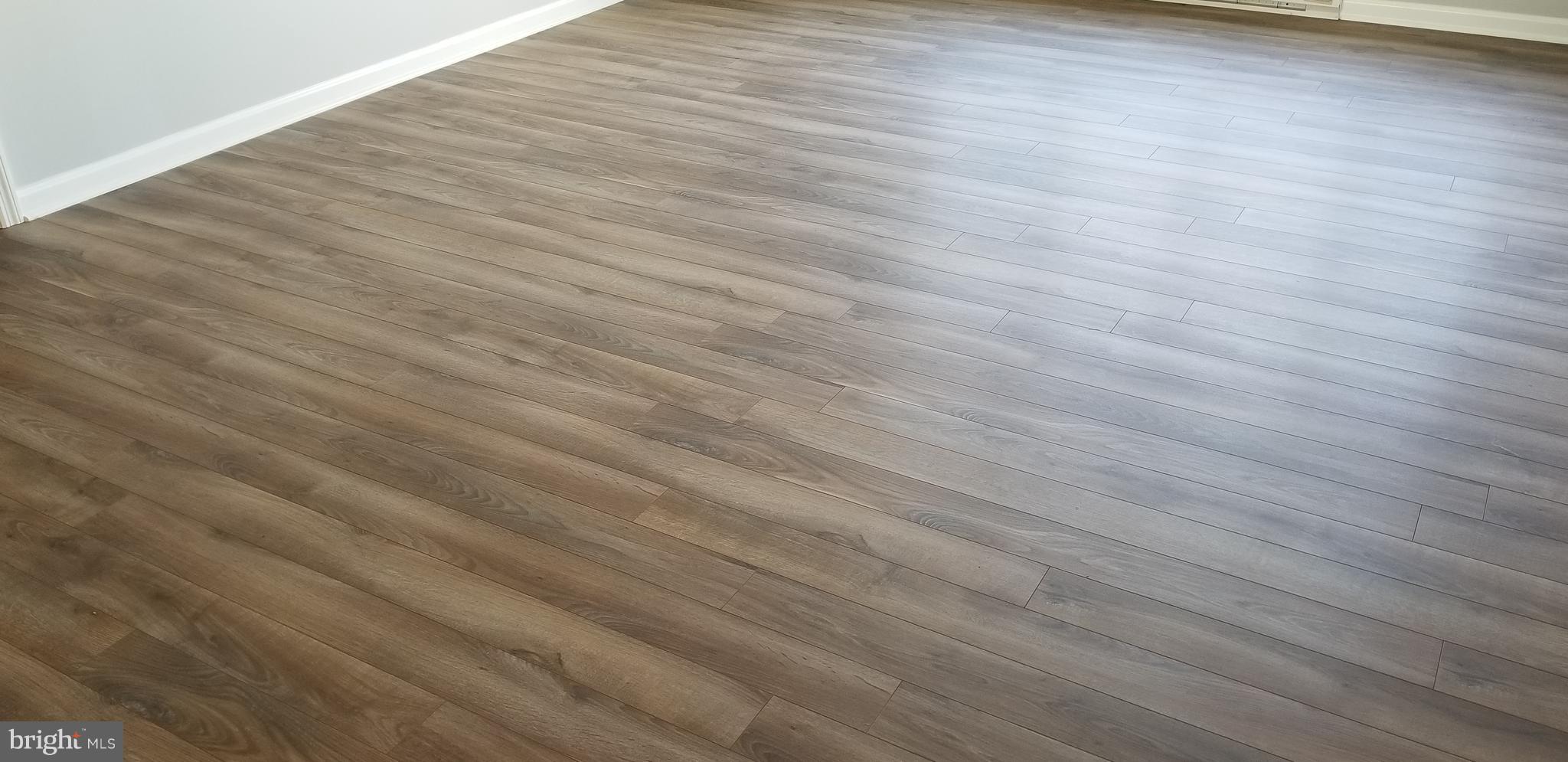 15515 Broadfording Road Clear Spring, MD 21722 - Photo 7 of 19 wooden floor in empty room