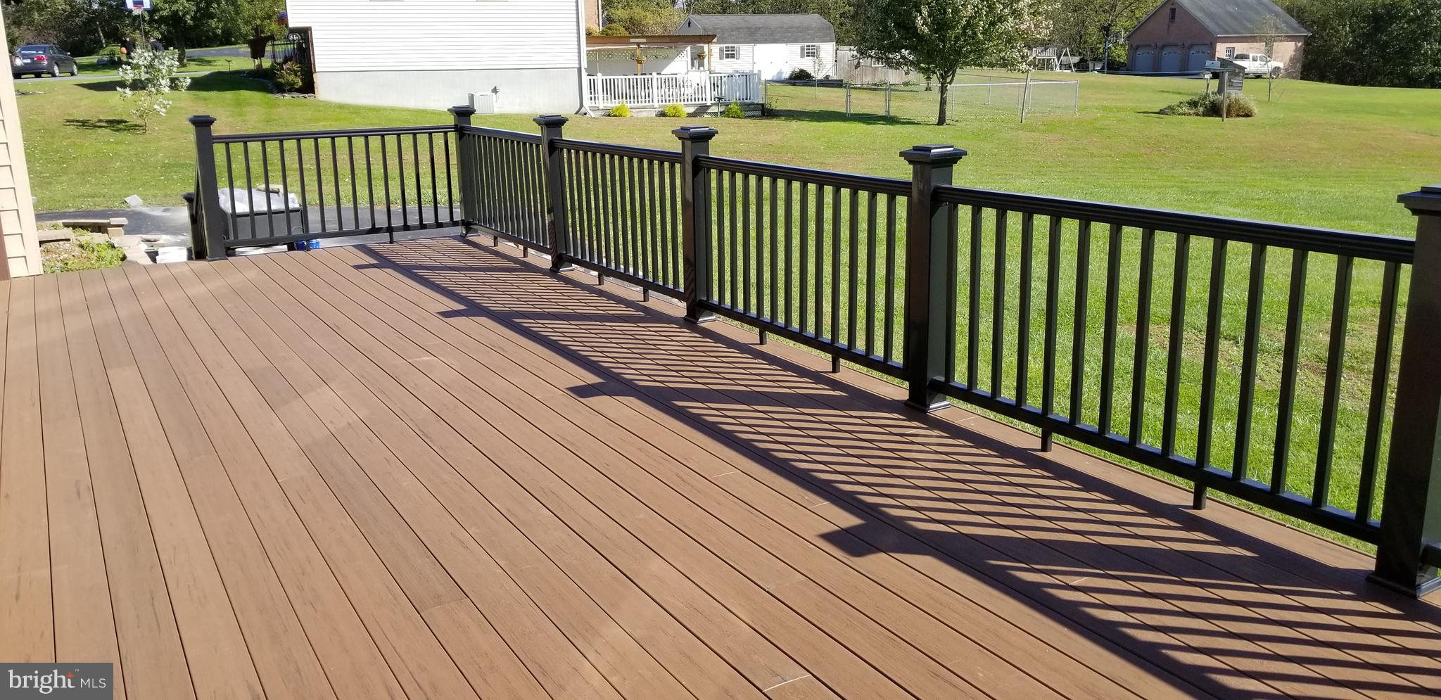 15515 Broadfording Road Clear Spring, MD 21722 - Photo 10 of 19 a view of deck with wooden floor and outdoor seating