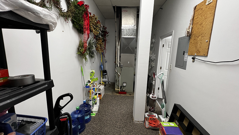 222 West Main Street Morrison, IL 61270 - Photo 12 of 21 a view of walk in closet with clothes and shoes