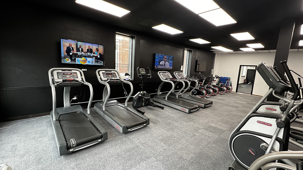 222 West Main Street Morrison, IL 61270 - Photo 19 of 21 a room with gym equipment and windows