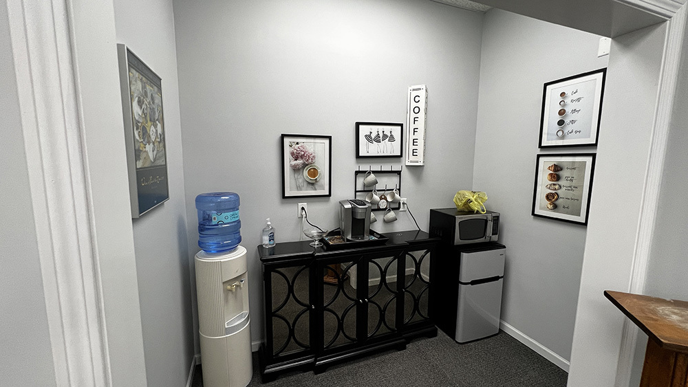 222 West Main Street Morrison, IL 61270 - Photo 7 of 21 a view of a workspace with furniture and wooden floor