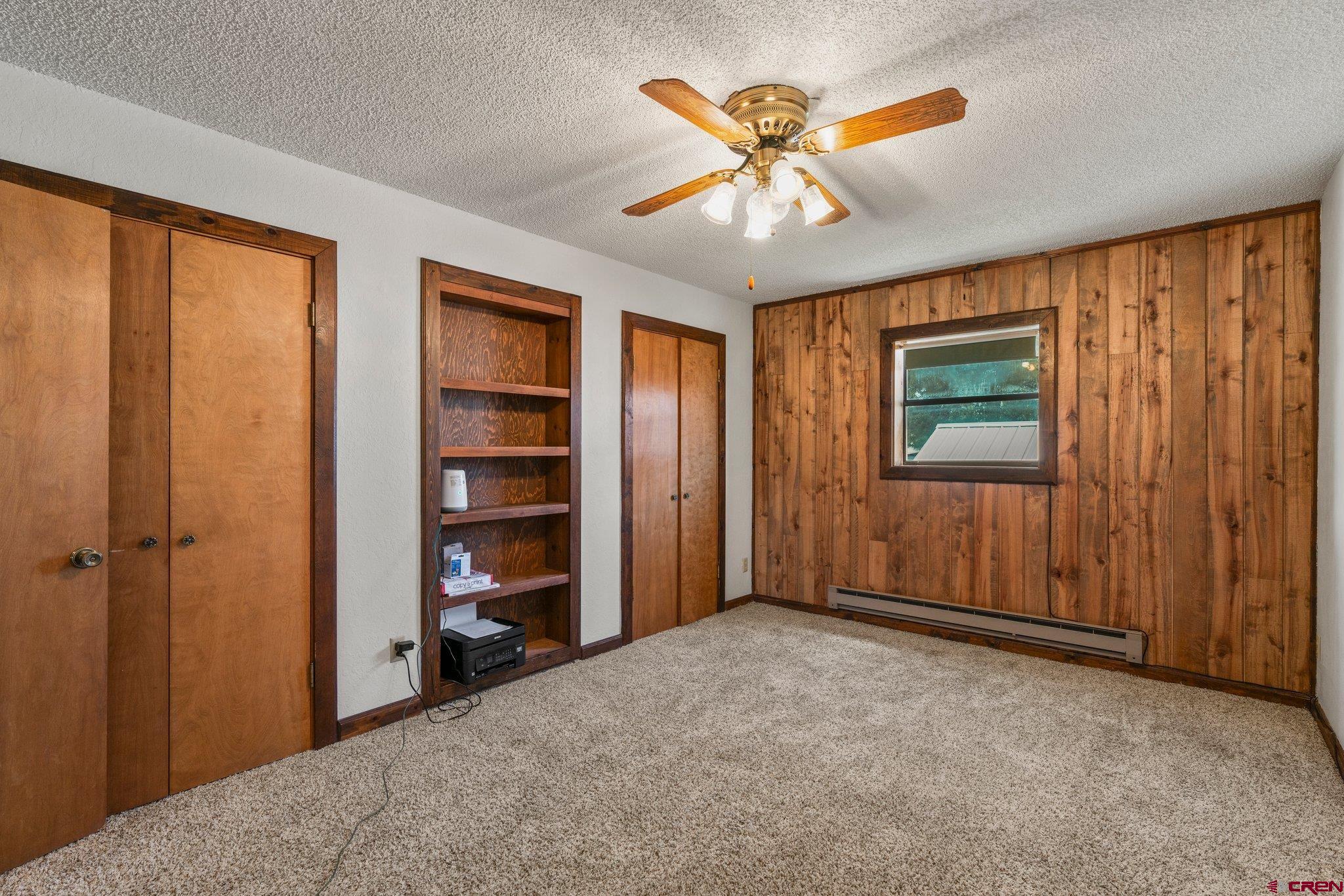 340 Ridge Road Durango, CO 81303 - Photo 16 of 35 wooden floor and windows in a room