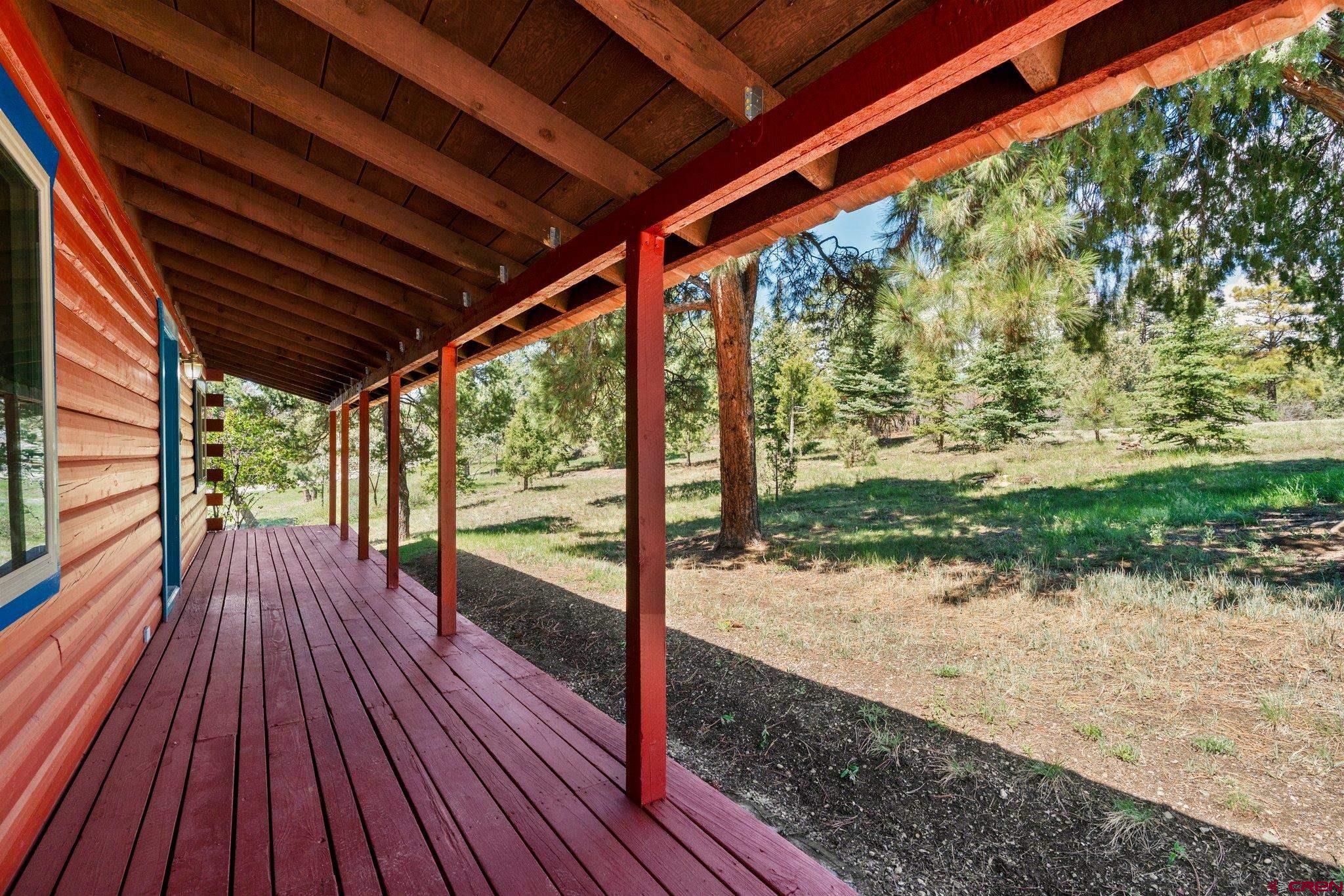 340 Ridge Road Durango, CO 81303 - Photo 19 of 35 a view of a backyard with wooden floor