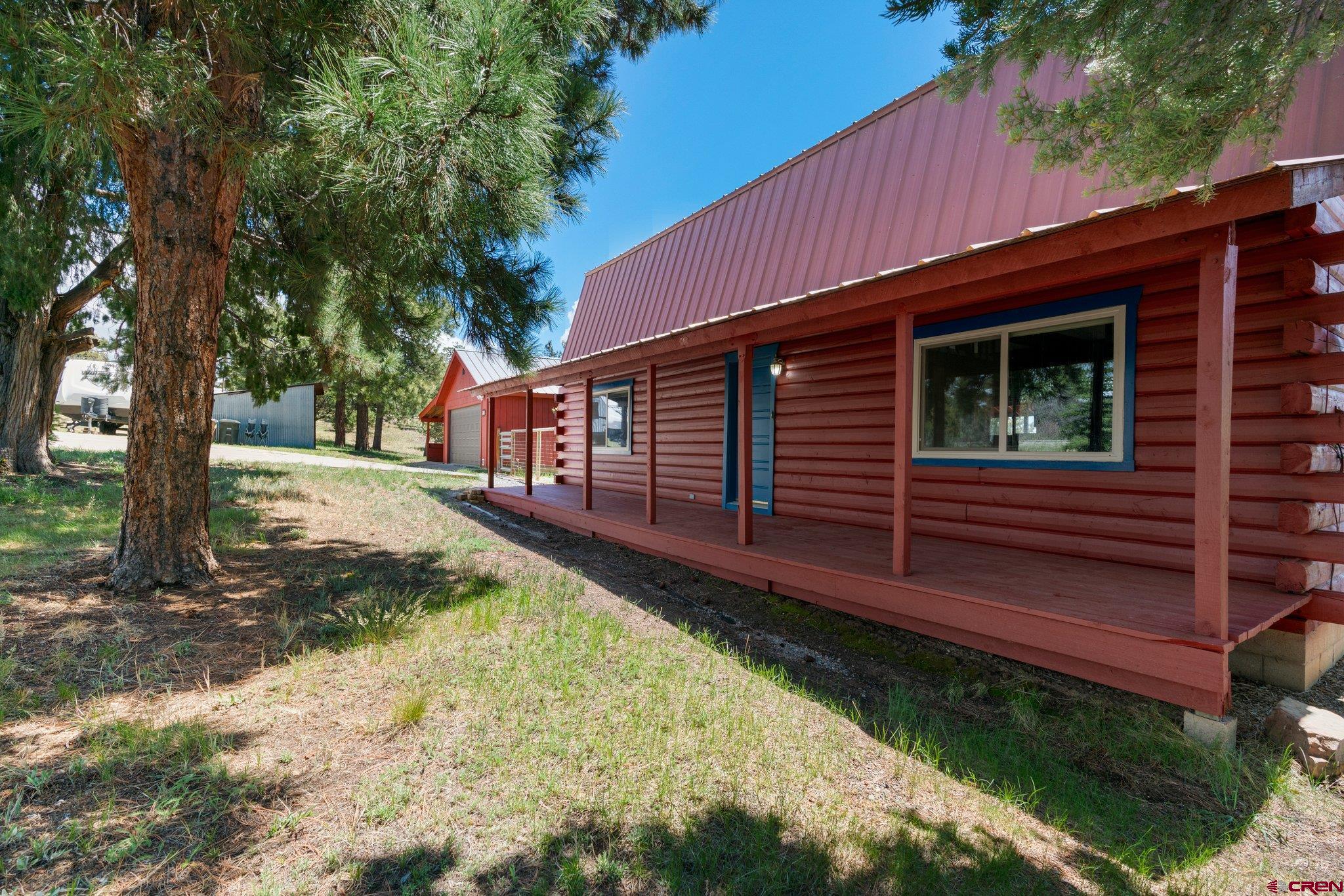340 Ridge Road Durango, CO 81303 - Photo 31 of 35 a view of a house with backyard and sitting area