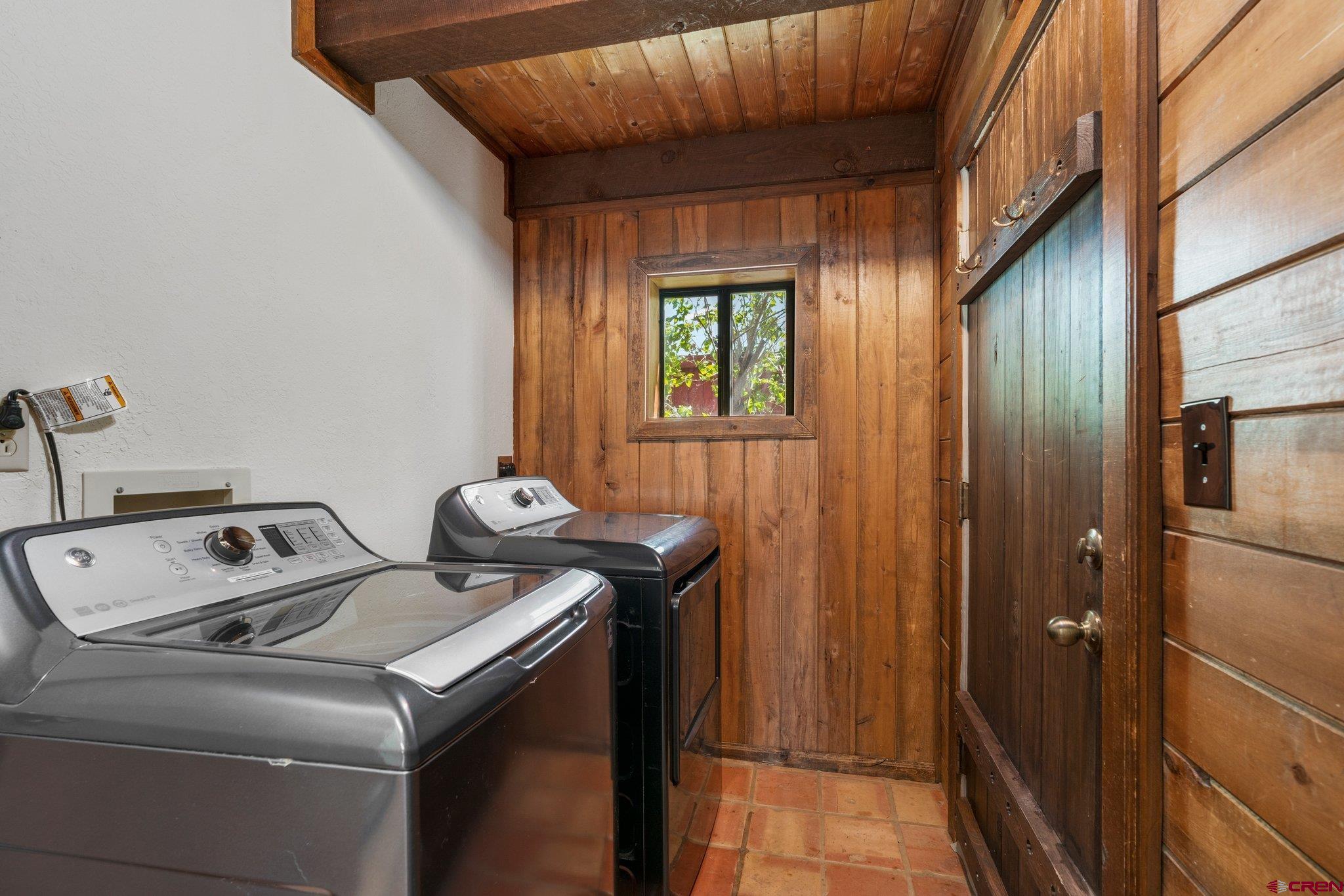 340 Ridge Road Durango, CO 81303 - Photo 9 of 35 a utility room with dryer and washer