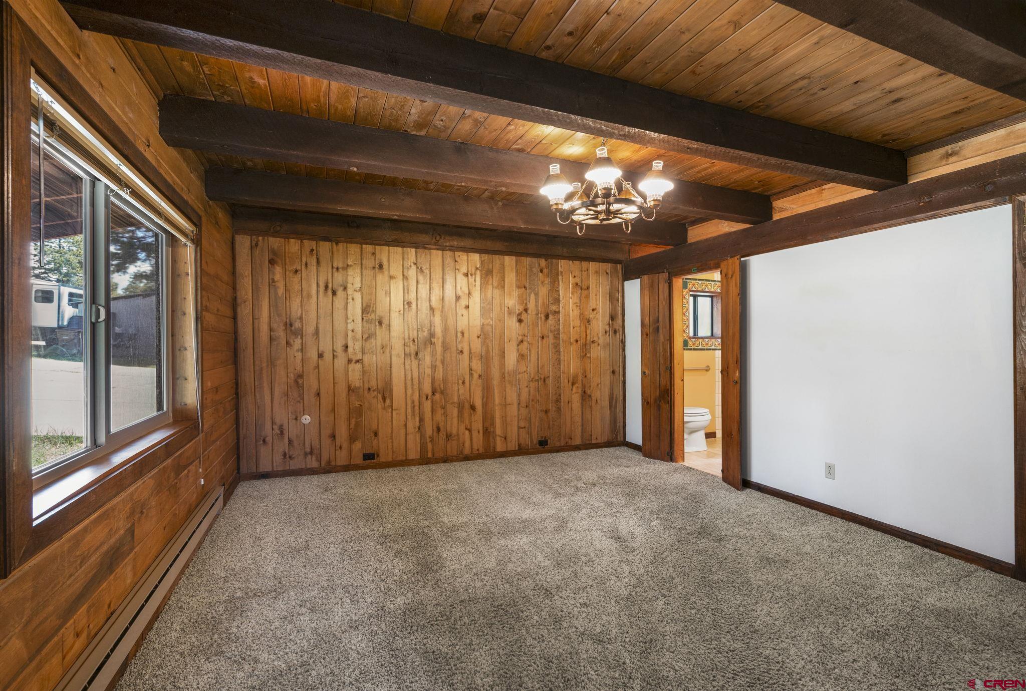340 Ridge Road Durango, CO 81303 - Photo 10 of 35 a view of an empty room with a window