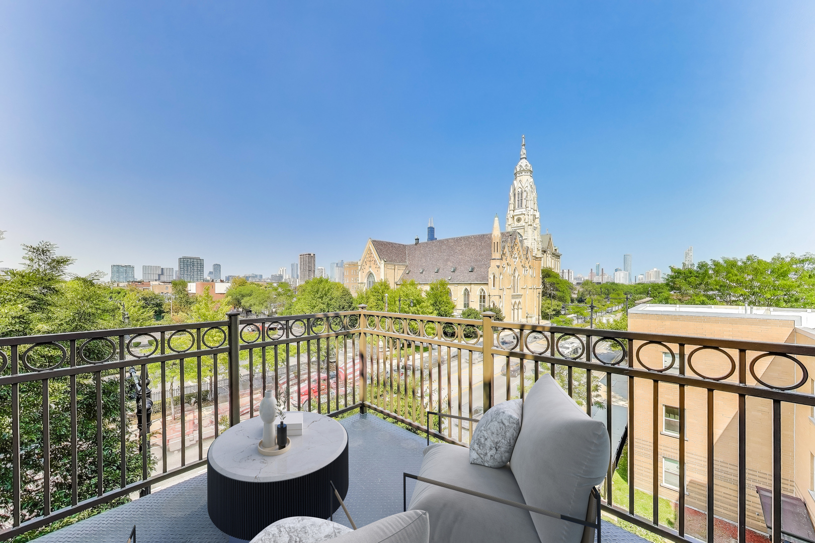 1155 West Roosevelt Road, Unit 412 Chicago, IL 60608 - Photo 13 of 31 a view of a patio with furniture and city view